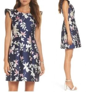 1901 Jacquard Metallic Flutter Sleeve Floral Fit And Flare Dress 7254